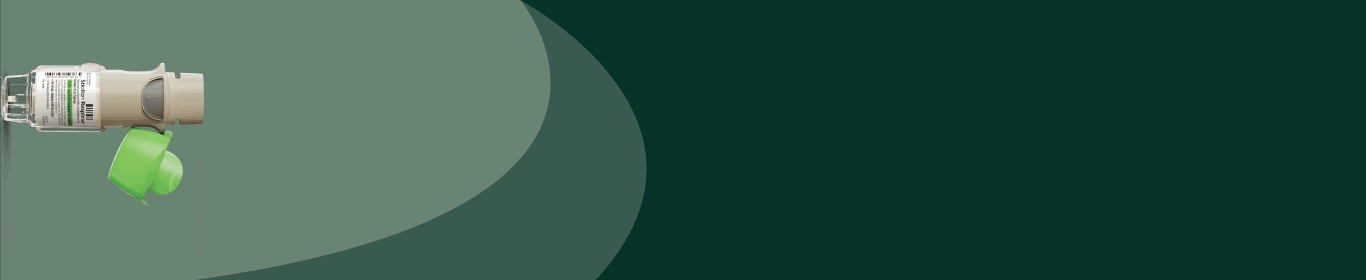 A STIOLTO RESPIMAT Inhalation Spray on its side spraying soft mist banner